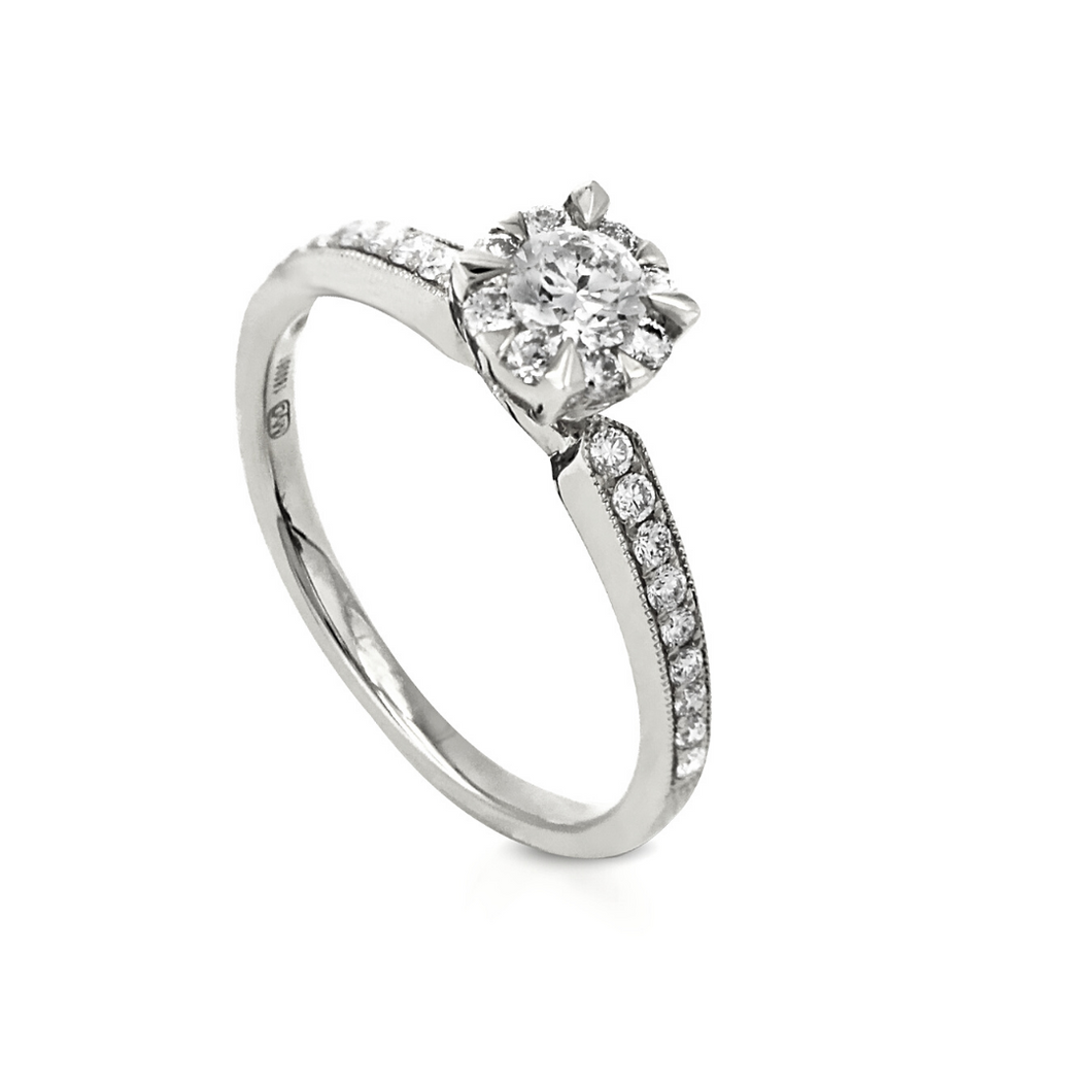image: The My Diamond Philippines Claw Prong Milgrain Ring with Pave-Set Side Stones is crafted in 14K white gold that features a 0.22-carat diamond and 28 pieces of 0.32-carat diamond side stones with a clarity grading of VS-SI1 and a combination of colors F-G for engagement 