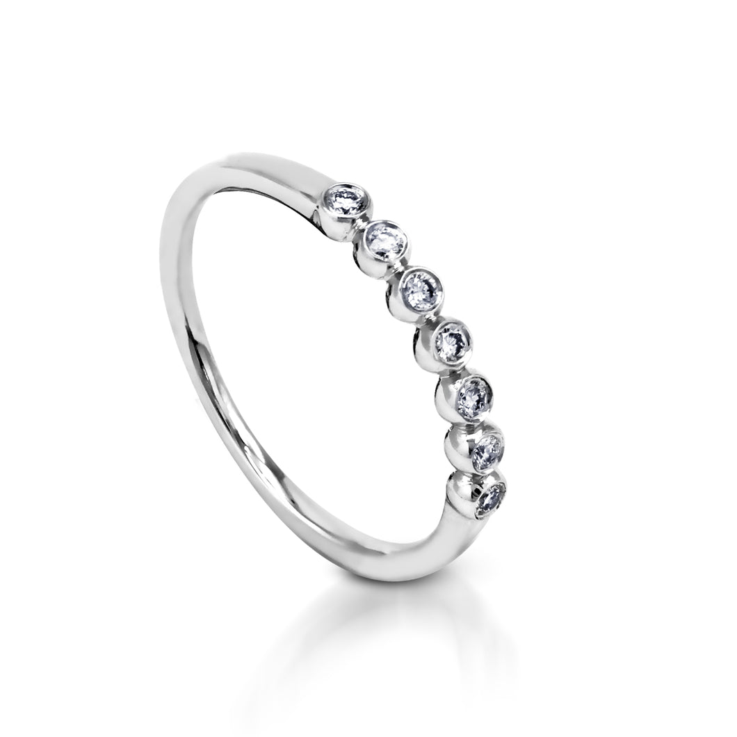 My Diamond Philippines Jewelry Store Rings for women The Petite Bezel set ring is crafted in 14K White Gold and features 7 pieces of 0.12-carat diamonds in total weight with a clarity grading of VS-SI1 and colors F to G.