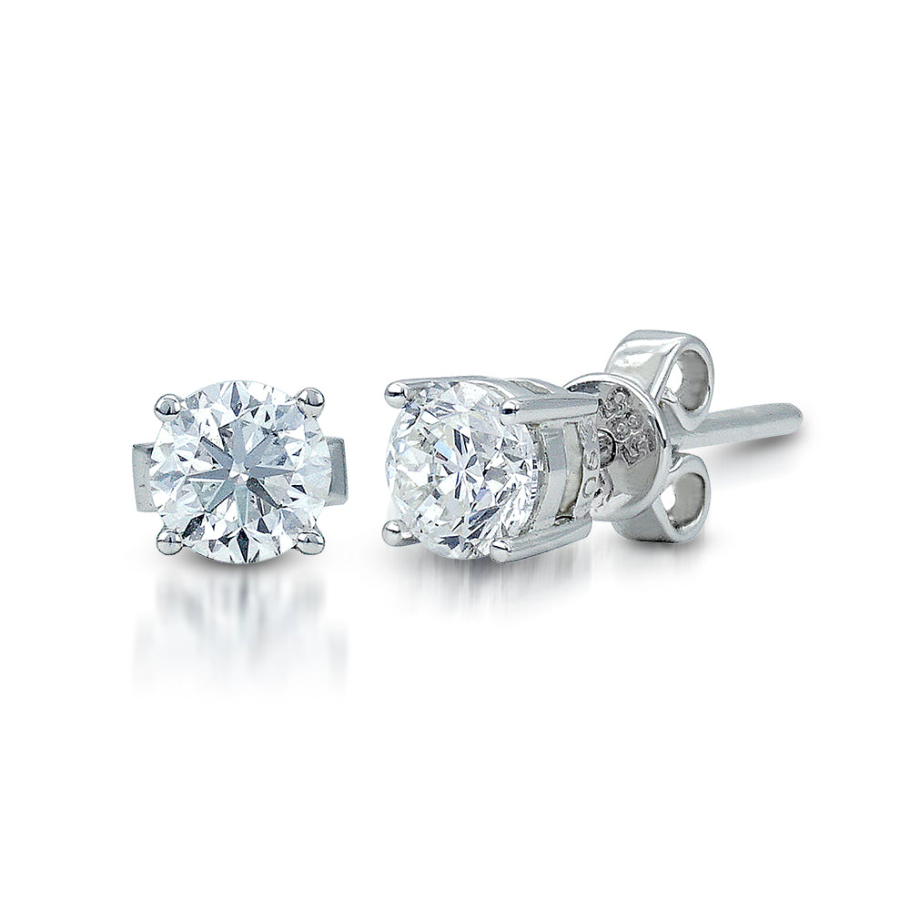 The Classic Solitaire Stud Earrings is crafted in 14K White Gold and each piece features 2 pieces round brilliant diamond each in size 4.3x4.3x2.6 with VS1-2 in clarity grading and in the color I. Total carat weight is 0.61ctw. Inclusive of My Diamond Jewelry Box and Jewelry Certificate 
